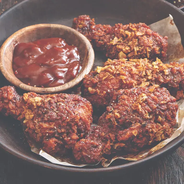 Alitas de pollo con salsa harissa