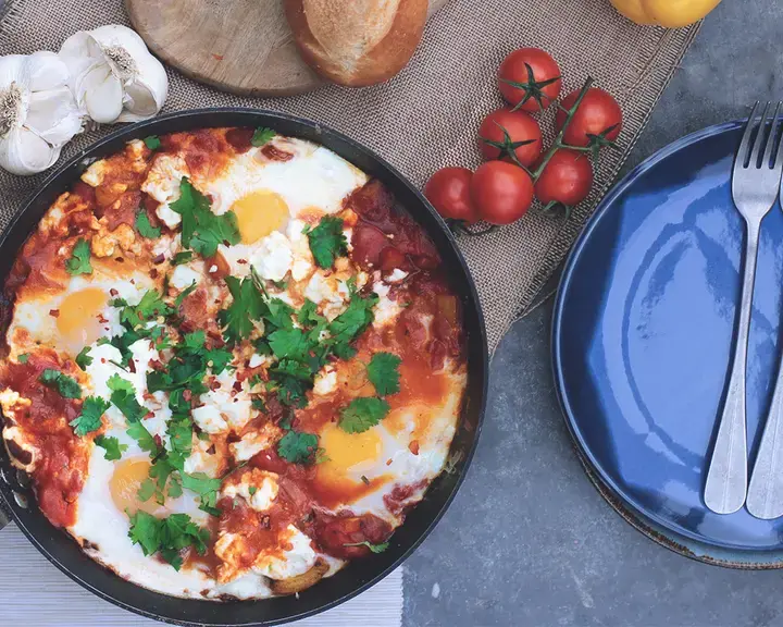 Huevos en salsa de tomate